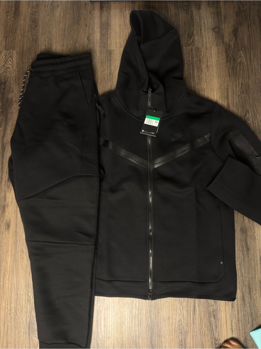 Nike Black Full-Zip Athletic Jacket with Subtle Chevron